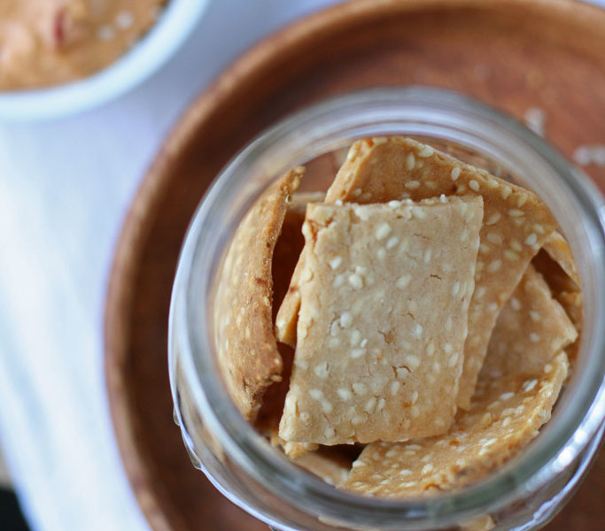 Delightfully crunchy and thin, these gluten-free garlic crispy rice crackers take less than 30 minutes to make from start to finish!