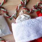 Conflicted about whether to give homemade or handmade store bought gifts? Combine both and create the perfect stocking stuffer gift bag! Learn how here.