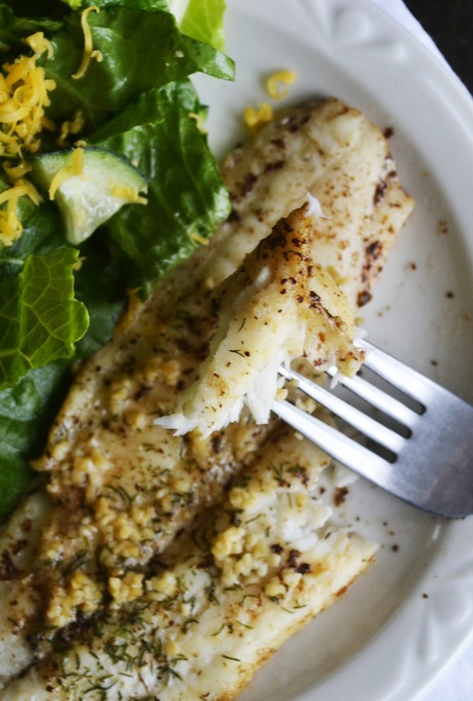 What is the perfect baked flounder recipe? Aromatic garlic, mild dill, and sweet browned butter. Yep -- perfect, tasty, AND easy. 