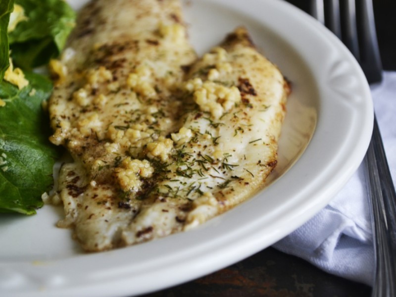 What is the perfect baked flounder recipe? Aromatic garlic, mild dill, and sweet browned butter. Yep -- perfect, tasty, AND easy.