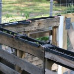 I love the idea of vertical gardening so I turned my extended pallet chicken run into a DIY pallet top garden to make the most of my space. Learn more here!