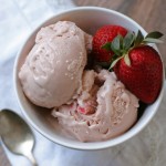 Enjoy this flavorful and creamy homemade dairy-free strawberry ice cream made with simple ingredients like maple syrup, coconut milk, vanilla, and pastured eggs.